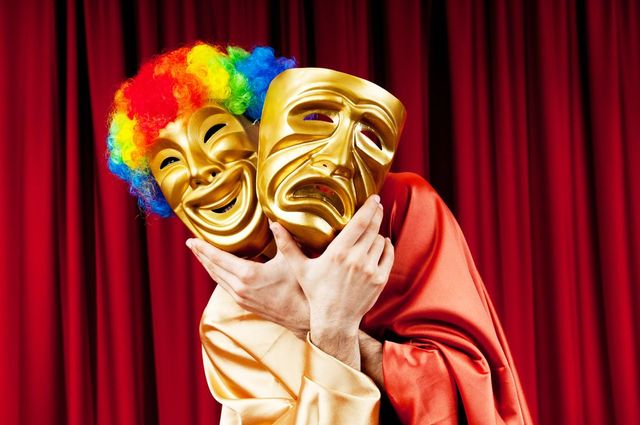 Actor with maks in a funny theater concept