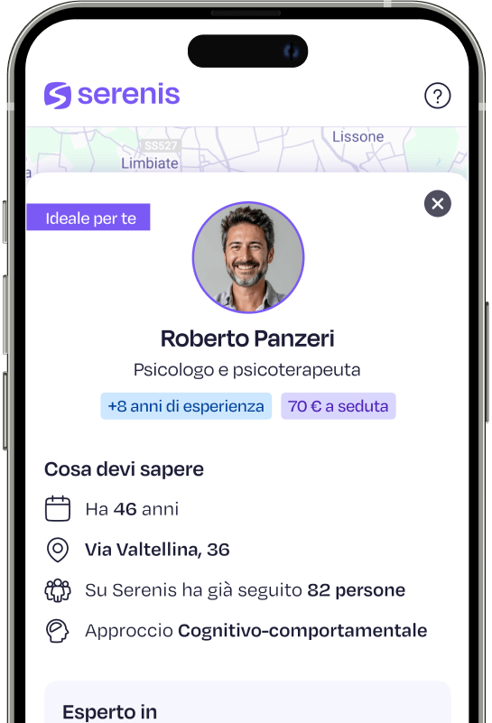 Profilo di un terapeuta sull'app Serenis, con informazioni su esperienza, età, indirizzo e approccio cognitivo-comportamentale.
